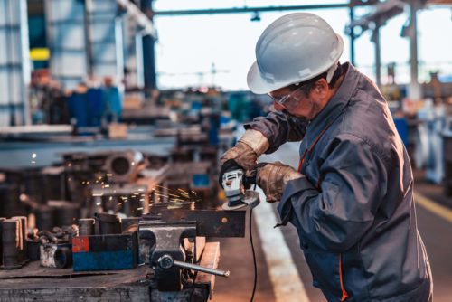 Construction worker working in facility